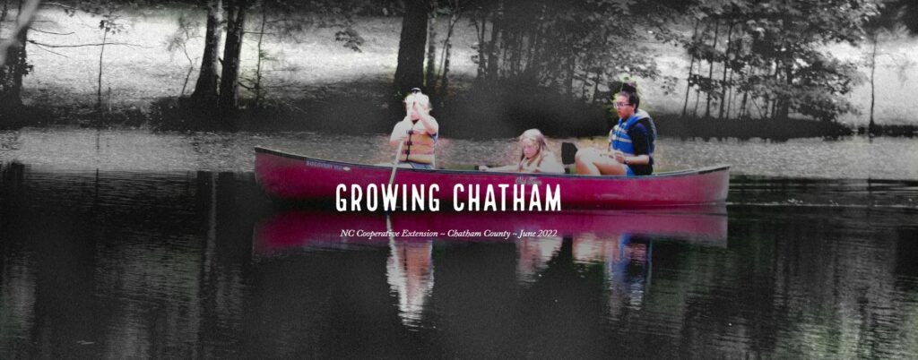 Children in a canoe with their father. The words Growing Chatham in front of them.