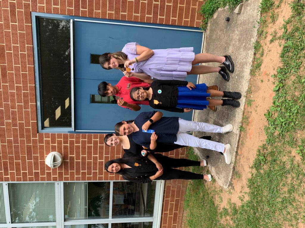 Chatham County 4-H Members Presenting at District Activity Day. From left to right, back row: Reyna Nava, Kenia Uribe, Giancarlo Lopez, and Avery Wright. From left to right, front row: Hailey King and Haliey Zarate-Cruz.